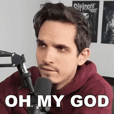 A Man Sitting In Front Of A Microphone With The Words Oh My God Written On His Face . GIF