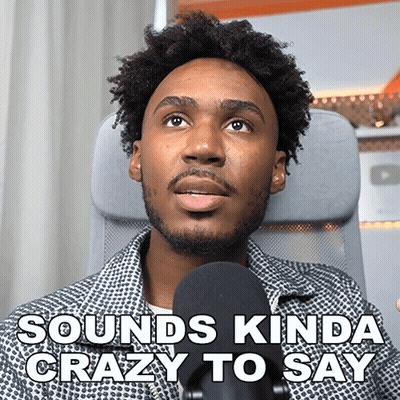 A Man Sitting In Front Of A Microphone With The Words " Sounds Kinda Crazy To Say " Above Him GIF