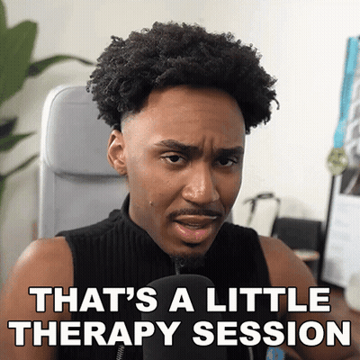 A Man Sitting In Front Of A Microphone With The Words That 'S A Little Therapy Session Above Him GIF