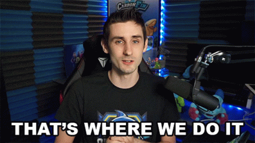 A Man Sitting In Front Of A Microphone With The Words That 'S Where We Do It Above Him GIF