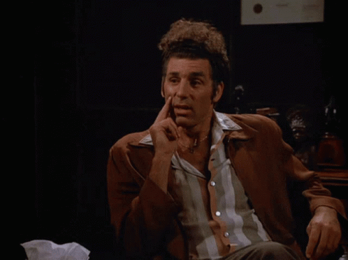 A Man Sitting In Front Of A Screen That Says That 'S True GIF