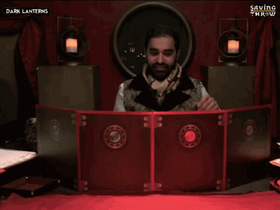 A Man Sitting In Front Of A Screen With The Words That Lady 'S Back On It GIF