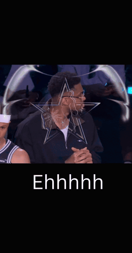 A Man Sitting In Front Of A Star With The Word Ehhhh On It GIF
