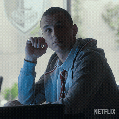 A Man Sitting In Front Of A Window With The Word Netflix On The Bottom GIF