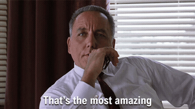 A Man Sitting In Front Of A Window With The Words That 'S The Most Amazing Above Him GIF