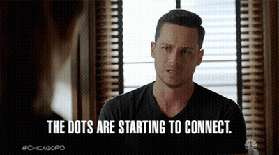 A Man Sitting In Front Of A Window With The Words " The Dots Are Starting To Connect " GIF