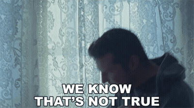 A Man Sitting In Front Of A Window With The Words We Know That 'S Not True Below Him GIF