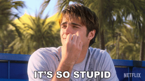 A Man Sitting On A Bench With The Words " It 'S So Stupid " Written Above Him GIF
