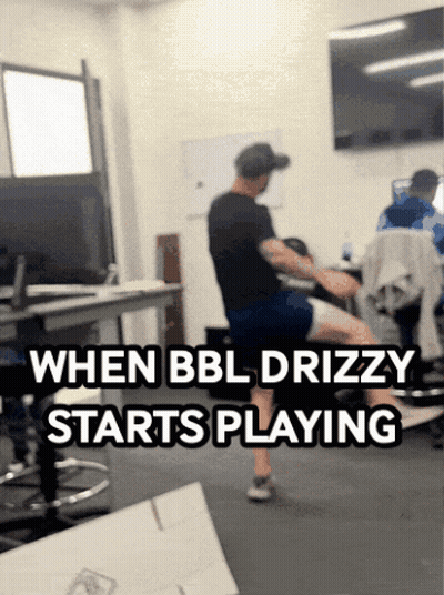 A Man Sitting On A Chair With The Words When Bbl Drizzy Starts Playing GIF