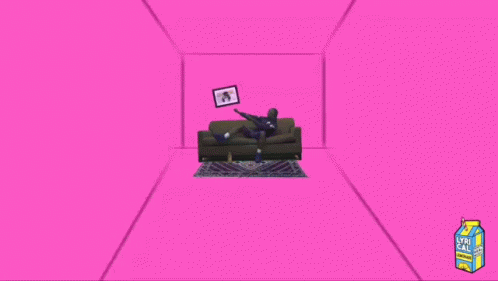 A Man Sitting On A Couch Next To A Box Of Lyri Cax GIF