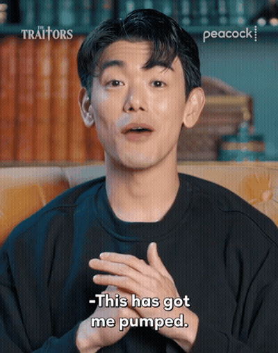 A Man Sitting On A Couch Says This Has Got Me Pumped On Peacock GIF