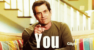 A Man Sitting On A Couch Wearing A Shirt That Says " You " GIF