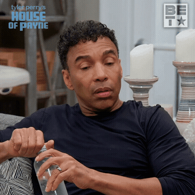 A Man Sitting On A Couch With A House Of Payne Logo On The Bottom GIF