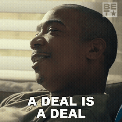 A Man Sitting On A Couch With The Words A Deal Is A Deal On His Face GIF