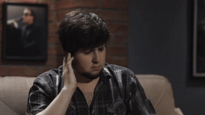 A Man Sitting On A Couch With The Words " Did They Stroke Out " Above Him GIF