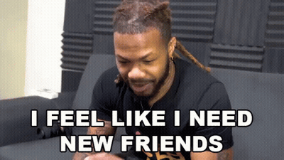 A Man Sitting On A Couch With The Words I Feel Like I Need New Friends GIF