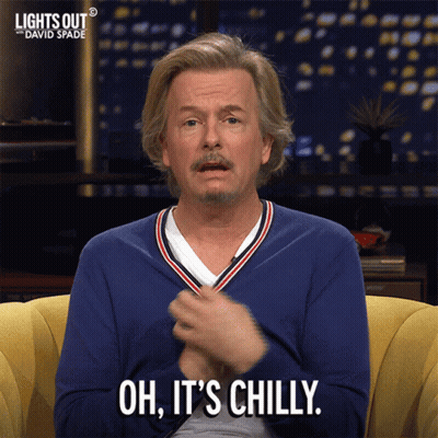 A Man Sitting On A Couch With The Words Oh It 'S Chilly On His Face GIF