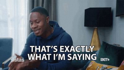 A Man Sitting On A Couch With The Words That 'S Exactly What I 'M Saying Behind Him GIF