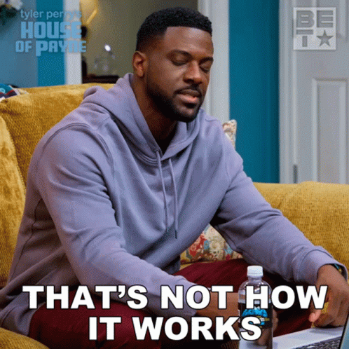 A Man Sitting On A Couch With The Words That 'S Not How It Works Next To Him GIF