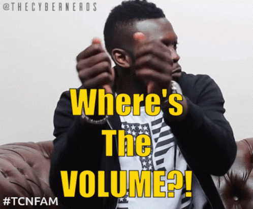 A Man Sitting On A Couch With The Words " Where 'S The Volume " On His Face GIF
