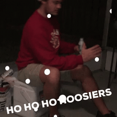 A Man Sitting On A Toilet With The Words Ho Ho Ho Hoosier Written On The Bottom GIF