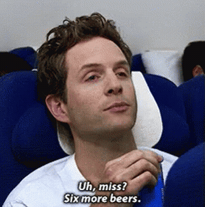A Man Sitting On An Airplane Says " Uh Miss ? Six More Beers " GIF