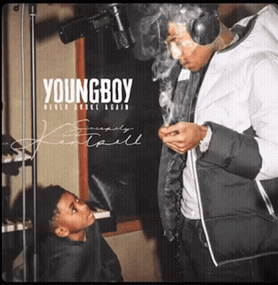 A Man Smoking A Cigarette Next To A Young Boy On The Cover Of Young Boy Never Broke Again GIF