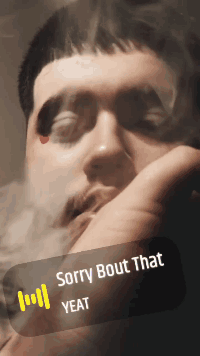 A Man Smoking A Cigarette With The Words " Sorry Bout That Yeat " Above Him GIF
