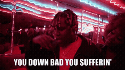 A Man Smoking A Cigarette With The Words You Down Bad You Sufferin ' GIF