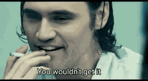 A Man Smoking A Cigarette With The Words " You Would N't Get It " Written Below Him GIF