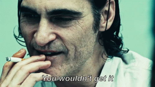A Man Smoking A Cigarette With The Words " You Would N't Get It " Written Below Him GIF