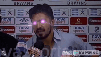 A Man Speaking Into A Microphone In Front Of A Nova Sports Sign GIF