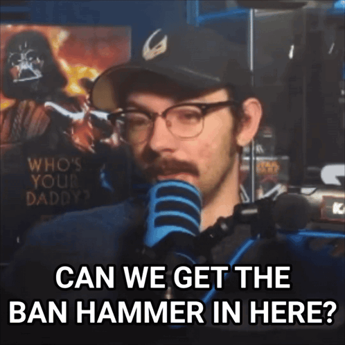 A Man Speaking Into A Microphone With The Words " Can We Get The Ban Hammer In Here " Below Him GIF