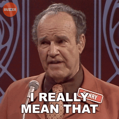 A Man Speaking Into A Microphone With The Words " I Really Mean That " Above Him GIF