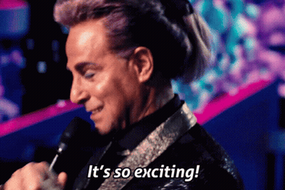 A Man Speaking Into A Microphone With The Words It 'S So Exciting GIF