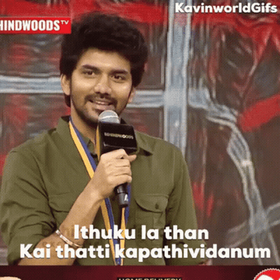 A Man Speaking Into A Microphone With The Words " Ithuku La Than Kai Thatti Kapathividanum " GIF