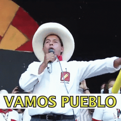 A Man Speaking Into A Microphone With The Words Vamos Pueblo Written Below Him GIF