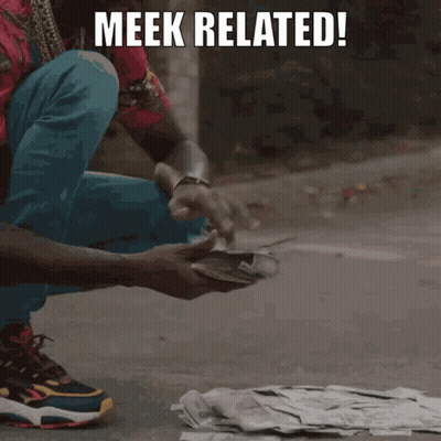 A Man Squatting On The Ground With The Words Meek Related GIF