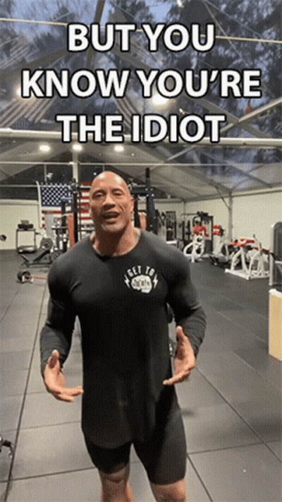 A Man Standing In A Gym With The Words But You Know You 'Re The Idiot On The Bottom GIF