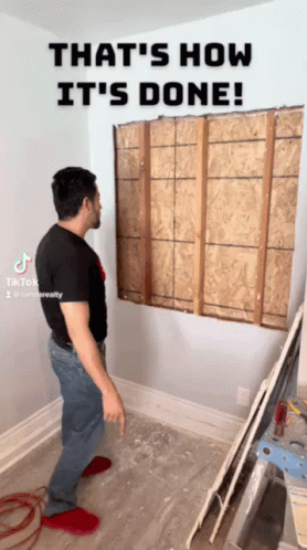 A Man Standing In A Room With The Words That 'S How It 'S Done On The Top GIF