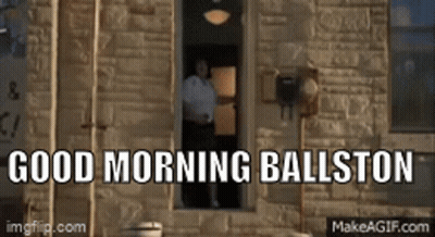 A Man Standing In A Window With The Words Good Morning Ballston Written Above Him GIF