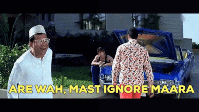 A Man Standing In Front Of A Blue Car With The Words " Are Wah Mast Ignore Maara " On The Bottom GIF