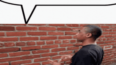 A Man Standing In Front Of A Brick Wall With A Speech Bubble Behind Him GIF