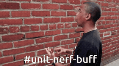 A Man Standing In Front Of A Brick Wall With #Unit-Nerf-Buff Written On The Bottom GIF
