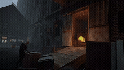 A Man Standing In Front Of A Building With A Fire Coming Out Of It GIF
