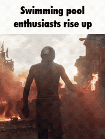 A Man Standing In Front Of A Fire With The Words Swimming Pool Enthusiasts Rise Up Above Him GIF