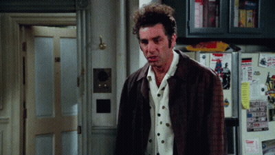 A Man Standing In Front Of A Fridge That Has A Sticker On It That Says ' Today ' On It GIF