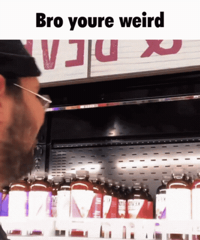 A Man Standing In Front Of A Fridge With The Words Bro Youre Weird GIF
