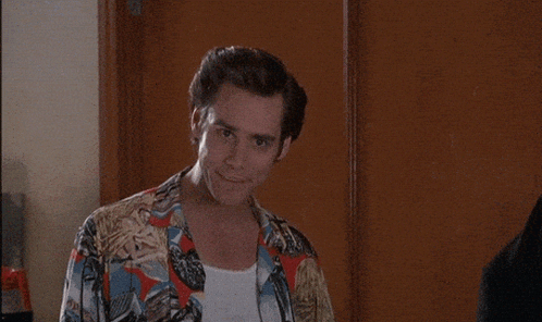 A Man Standing In Front Of A Sign That Says " Alllll Righty Then " GIF