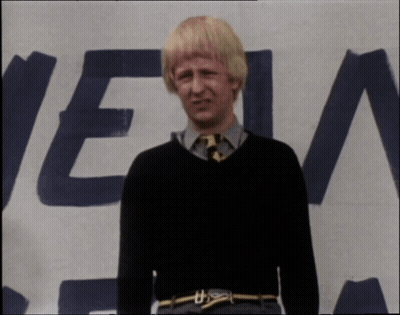 A Man Standing In Front Of A Sign That Says " Get It Right " GIF